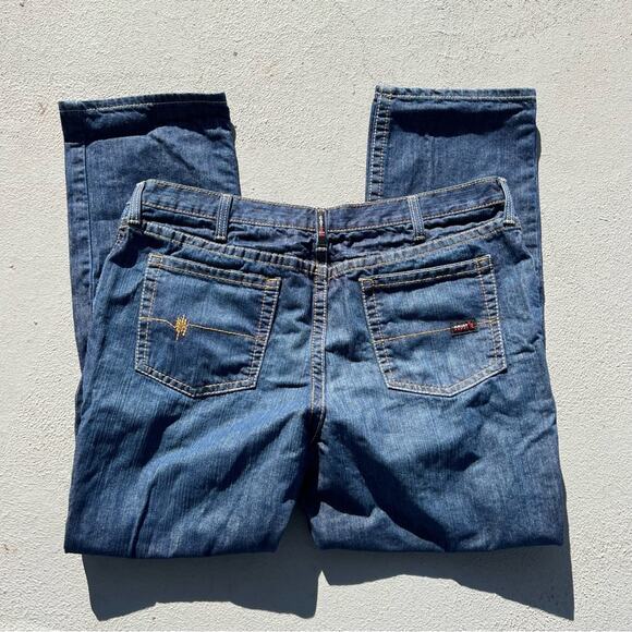 Ariat M4 FR low rise boot cut jeans 44x34